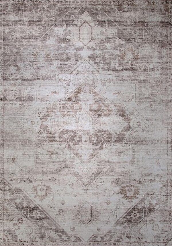 Vintage faded oriental carpet with intricate patterns.