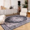 Modern living room with patterned area rug.