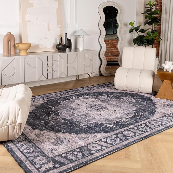 Modern living room with patterned area rug.