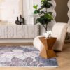 Modern living room with abstract decor and chair