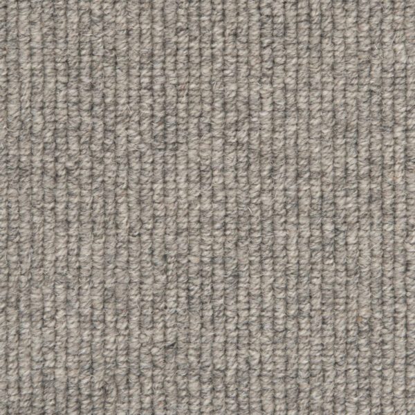 Gray woven carpet texture close-up