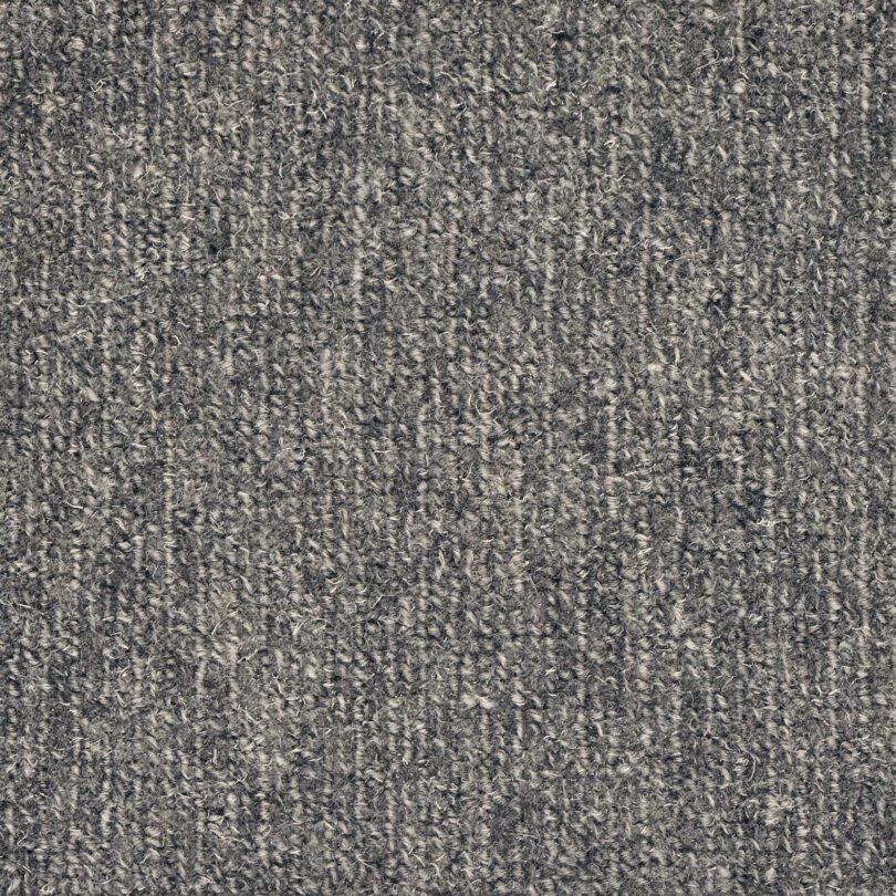 Gray woolen carpet texture close-up