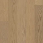 Light wood flooring with natural grain pattern.