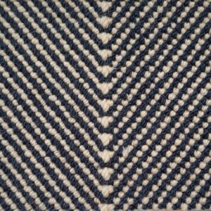 Chevron pattern in beige and navy threads.