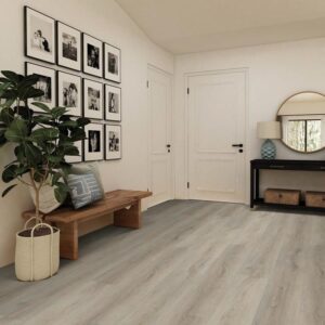 Modern hallway with framed photos and wooden bench.