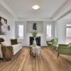 Modern living room with green chairs and fireplace