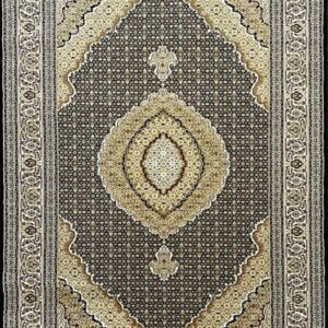Ornate geometric patterned rug in neutral colors