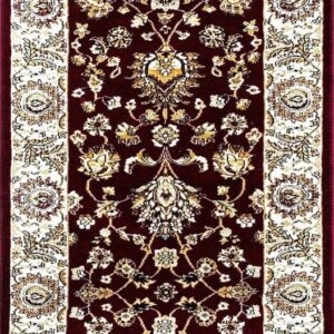 Ornate patterned red and white rug with floral designs.