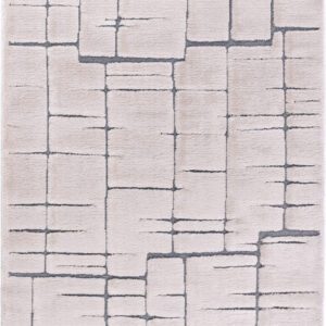 Beige rug with geometric pattern design.