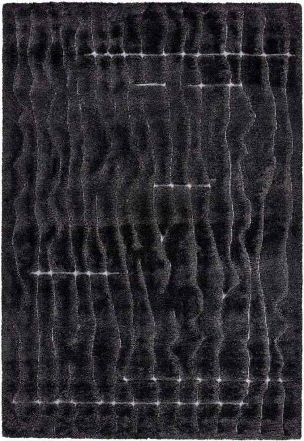 Dark, textured shag rug with a wavy pattern.