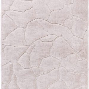 Beige rug with abstract geometric pattern