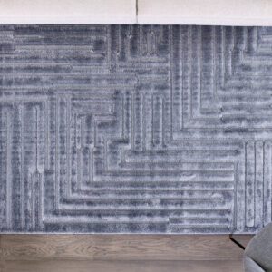 Gray geometric rug on wooden floor