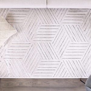 Geometric patterned area rug in modern living room.