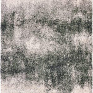 Textured rug with gray and black gradient design.