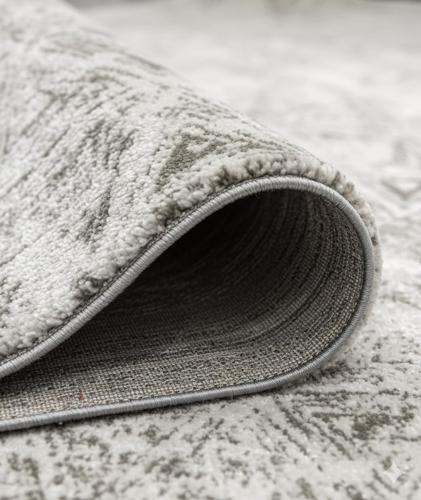 Close-up of rolled beige patterned carpet