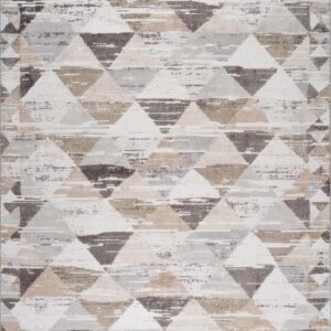 Geometric rug with triangular patterns in neutral tones.