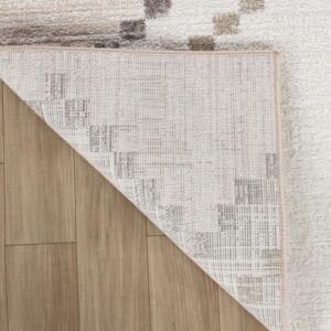 White rug corner flipped on wooden floor